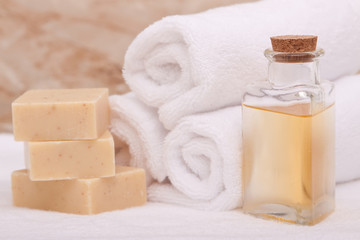 Obraz na płótnie Canvas Aromatherapy oil, soap, towels