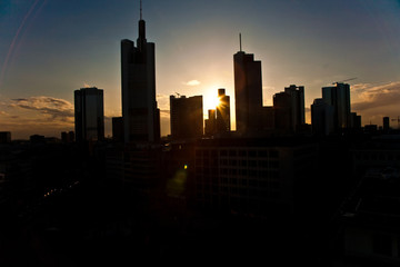 Naklejka premium sunset with skyscraper in Frankfurt downtown
