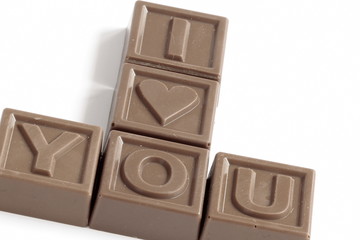 Inscription I love You made of little chocolates