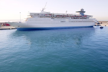 Fototapeta na wymiar Cruise boat moored on Balearic islands harbor