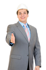 Handsome man with white hard hat saying welcome