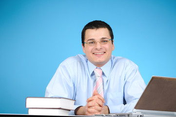 An engineer at work on blue background