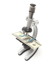 Microscope examining dollar strength