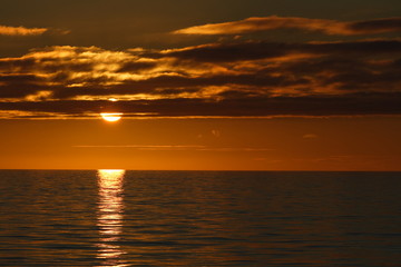 Sunset over Costa Rica. Sun reaching ocean