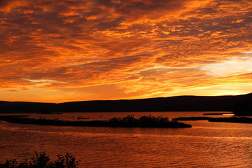 Sunset behind lake with beautiful sky in Quebec, Canada