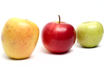 three multicolored apples in a row