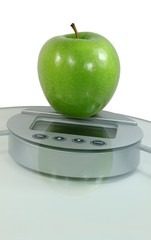 Apfel auf Personenwaage