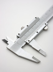 Trammel on white surface