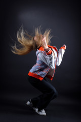 woman modern dancer against black background