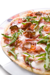 italian pizza with truffels and tomatoes