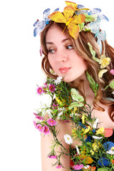 Girl with butterfly and flower on head. Spring hair.