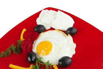 fried egg on red dish