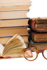 Pile of old books isolated on white background