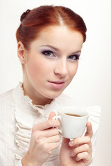 Business woman holding cup of coffee.