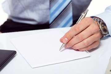 businessman's hand with pen
