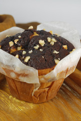 Chocolate muffin on a gold background