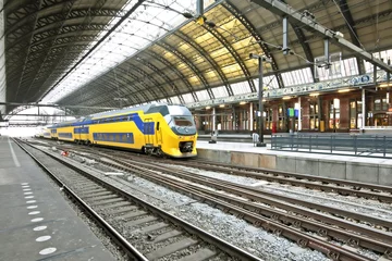 Fotobehang Train waiting in Central Station Amsterdam the Netherlands © Nataraj