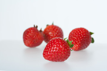 vier Erdbeeren