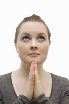 Worship - Cute christian woman praying to god
