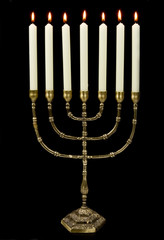 Gold menorah candles