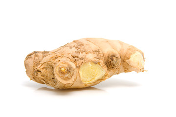 Fresh ginger over white background