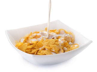 Cornflakes and pouring milk