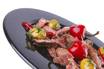 beef meat served on black