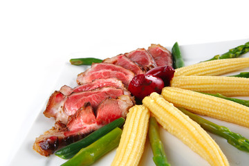 roast meat served with corns