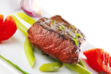 beef fillet served on white
