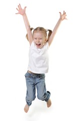 very excited cute little girl jumping studio shot on white