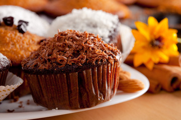 Chocolate muffin with coffe cup