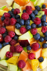 Fruit Salad of Blueberries, Raspberries, Melon, Kiwi, Apple, Ora