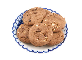Chocolate cookies in plate isolated on white background