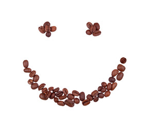 Grains of coffee in the form of smiling face
