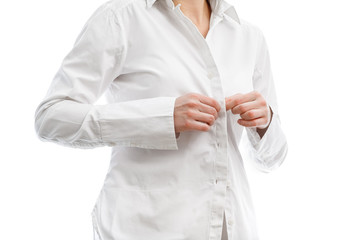 buttoning a white shirt