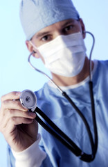 Physician holding stethoscope