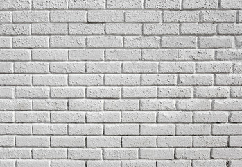 White painted blank brick wall background.