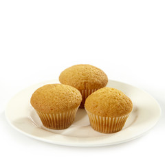 three muffins on white plate