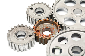 Gears engagement rusty part on white background