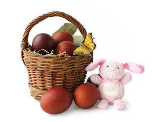 Basket with Easter eggs and the rabbit
