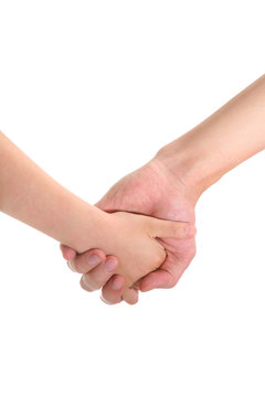adult's and child's hands holding together