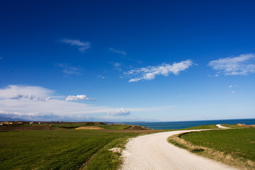 Country road and blue sky