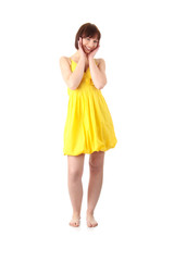 Teen girl in yellow summer dress