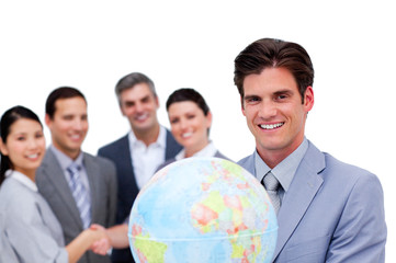 Successful manager and his team holding a terrestrial globe