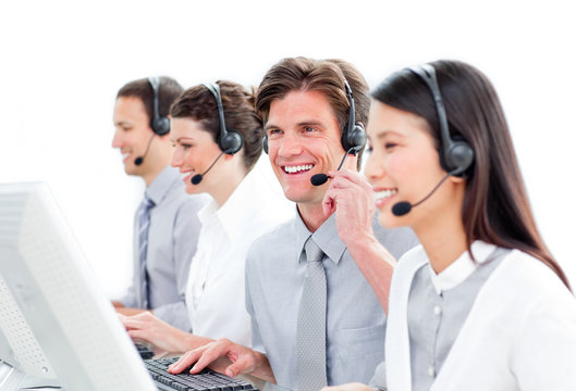 Portrait of charismatic customer service agents working in a cal