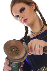 Mädchen im Blaumann mit Winkelschleifer