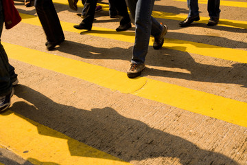 Foots at zebra crossing