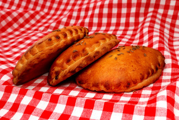 Patties on a red tablecloth