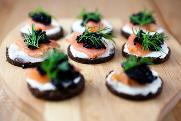 Snack with salmon and caviar