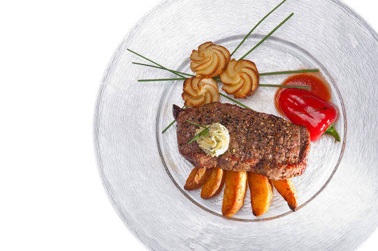 Rumpsteack mit Kartoffeln un Parika